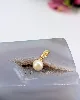 pendentif en or orné d'une perle de culture ronde or 750 millième (18 ct) 0,83g