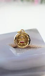 pendentif médaille d'amour plus qu'hier moins que demain serti d'un petit diamant et 2 rubis synthétiques or 750 millième (18 ct) 