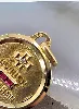 pendentif médaille d'amour plus qu'hier moins que demain serti d'un petit diamant et 2 rubis synthétiques or 750 millième (18 ct) 