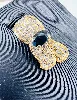 pendentif noeud centré d'un saphir et pavé de diamants or 750 millième (18 ct) 8,97g