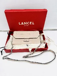 lancel portefeuille en chaîne ninon en cuir de vachette grainé gris mauve