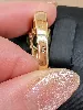 bague en or centrée d'un péridot épaulé de 16 diamants or 750 millième (18 ct) 9,09g