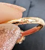 bague en 2 ors centrée d'un diamant solitaire d'environ 0,08ct  or 750 millième (18 ct) 2,43g