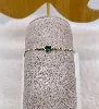 bracelet pl-or orné d'une barre pavé des oxydes centré d'oxyde vert en forme de goutte