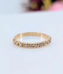 bague demie-alliance sertie de 11 diamants d'environv 0,22cts au total or 750 millième (18 ct) 1,85g