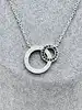 collier diana argent doule cercles oxydes de zirconium noirs et blancs argent 925 millième (22 ct) 2,49g