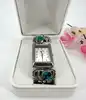 montre harpo paris en argent massif et turquoises mouvement quartz avec cadran rectangulaire et bracelet extensible en acier inoxy