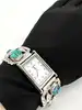 montre harpo paris en argent massif et turquoises mouvement quartz avec cadran rectangulaire et bracelet extensible en acier inoxy