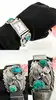 montre harpo paris en argent massif et turquoises mouvement quartz avec cadran rectangulaire et bracelet extensible en acier inoxy