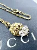 collier gucci en métal or vieilli motif tête de lion avec un oxyde ovale blanc