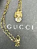 collier gucci en métal or vieilli motif tête de lion avec un oxyde ovale blanc