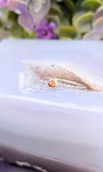 bague fine en or blanc centrée d'un saphir orange or 750 millième (18 ct) 0,79g