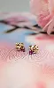 boucles d'oreilles forme papillon chacune sertie d'un rubis or 750 millième (18 ct) 0,74g