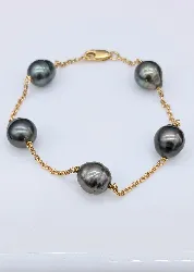 bracelet or orné de 5 perles de culture grises  or 750 millième (18 ct) 8,96g