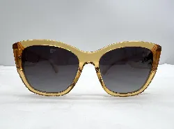 lunettes de soleil chanel avec des verres gris dégradés et la monture et les branches janues