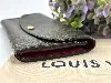 portefeuille louis vuitton émilie long en toile monogram et l'intérieur en cuir de veau grainé rouge