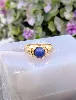 bague bombée centrée d'un lapis-lazuli rond en cabochon or 750 millième (18 ct) 7,87g