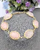 bracelet articulé orné de 6 quartz rose en cabochon  or 750 millième (18 ct) 27,90g