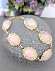 bracelet articulé orné de 6 quartz rose en cabochon  or 750 millième (18 ct) 27,90g