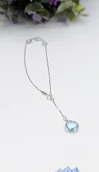 bracelet or blanc orné de 4 topazes facettées dont une pendante or 375 millième (9 ct) 1,38g