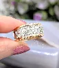 bague bandeau en 2 ors ornée d'une pavage de 14 diamants d'environ 1,12ct au total or 750 millième (18 ct) 7,88g