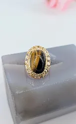 bague or ornée d'une pierre  l'oeil de tigre en cabochon or 750 millième (18 ct) 6,54g