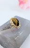 bague or ornée d'une pierre  l'oeil de tigre en cabochon or 750 millième (18 ct) 6,54g