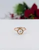 bague or rose centrée d'une perle synthétique or 750 millième (18 ct) 2,71g