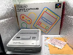 console nintendo super nes snes avec une manette