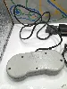 console nintendo super nes snes avec une manette