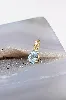 pendentif or serti d'une topaze bleue forme goutte d'eau or 750 millième (18 ct) 0,70g