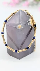 bracelet articulé en or motifs bamboo alternés de boules de lapis-lazuli or 585 millième (14 ct) 10,70g