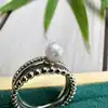 bague en argent ornée d'une perle et présente un design multi-anneaux texturé argent 925 millième (22 ct) 4,58g