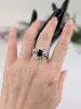 bague marguerite centrée d'un saphir entouré de 10 diamants or 750 millième (18 ct) 3,82g