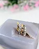 boucles d'oreilles en clips en 2 ors chacune sertie de 7 diamants d'environ 0,7ct au total or 750 millième (18 ct) 4,28g