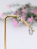boucles d'oreilles créoles en or blanc serties des oxydes taille princesse or 750 millième (18 ct) 3,53g
