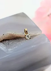 pendentif solitaire en or blanc serti d'un diamant d'environ 0,25ct taille brillant or 750 millième (18 ct) 0,62g