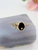 bague chevalière onyx sertie d'un diamant d'environ 0,02cts or 750 millième (18 ct) 4,94g