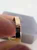 bague chevalière onyx sertie d'un diamant d'environ 0,02cts or 750 millième (18 ct) 4,94g
