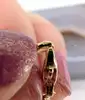 bracelet maille haricot plate serti de 3 émeraudes or 750 millième (18 ct) 6,65g