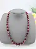 collier maille forçat en or orné des boules de grenats facettées alternés des billes en or or 750 millième (18 ct) 26,74g