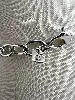 collier swarovski avec pendentif en cristal incolore et strass irisés