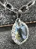 collier swarovski avec pendentif en cristal incolore et strass irisés