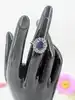 bague marquise centrée d'un saphir synthétique d'environ 2,5ct entouré des quartz blancs or 375 millième (9 ct) 3,75g