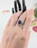 bague marquise centrée d'un saphir synthétique d'environ 2,5ct entouré des quartz blancs or 375 millième (9 ct) 3,75g