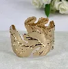bracelet / manchette motif feuille en acier doré