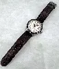 montre automatique seiko presage 4r57-00t0 cadran ivoire et bracelet rochet en cuir marron embossé crocodile
