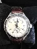 montre automatique seiko presage 4r57-00t0 cadran ivoire et bracelet rochet en cuir marron embossé crocodile
