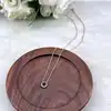 97397045 collier centré d'une pierre bleue et entournée des oxydes l45cm