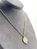 97436445 collier avec pendentif rond orné d'oxydes l45 cm
